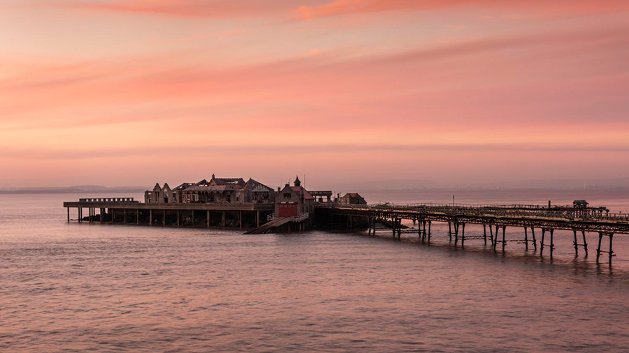 Pier photographed at sunset