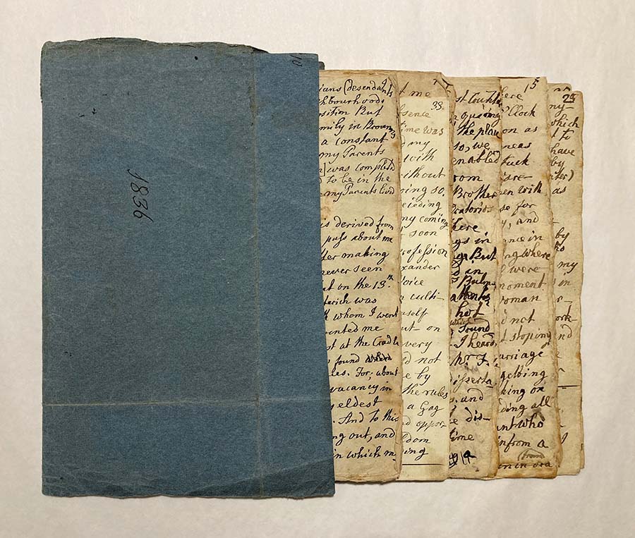 Front cover and several inside pages from a manuscript