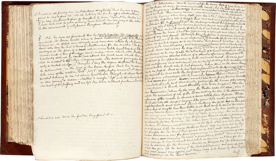 An open book with handwriting on the pages