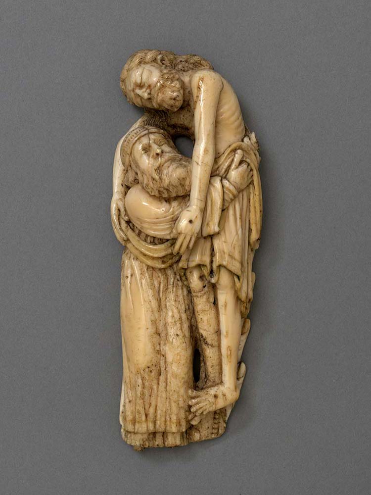 An ivory carving of Joseph of Arimathea lifting Christ's body from the cross